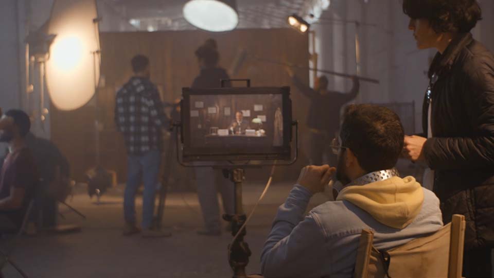 Film director framing a shot for a high-converting product video | Lumira Studio Video Production Hertfordshire